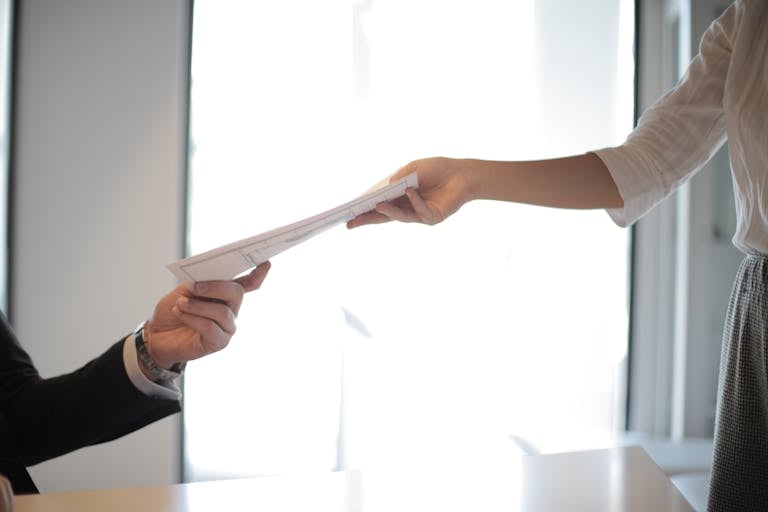 Same day courier handing over urgent document.
